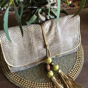 Gorgeous clutch—gold accents,soft leather 👏🏽💃🏽